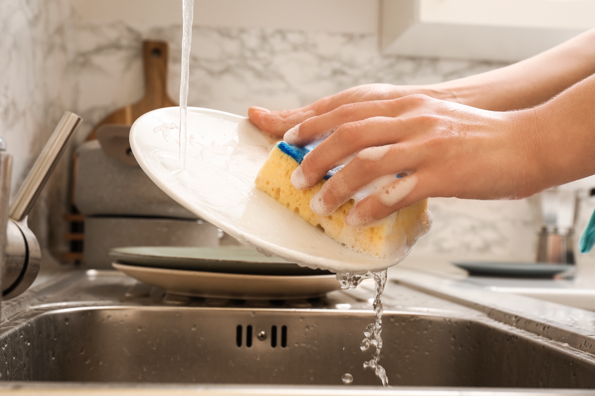 White mineral spots on clean dishes from hard water